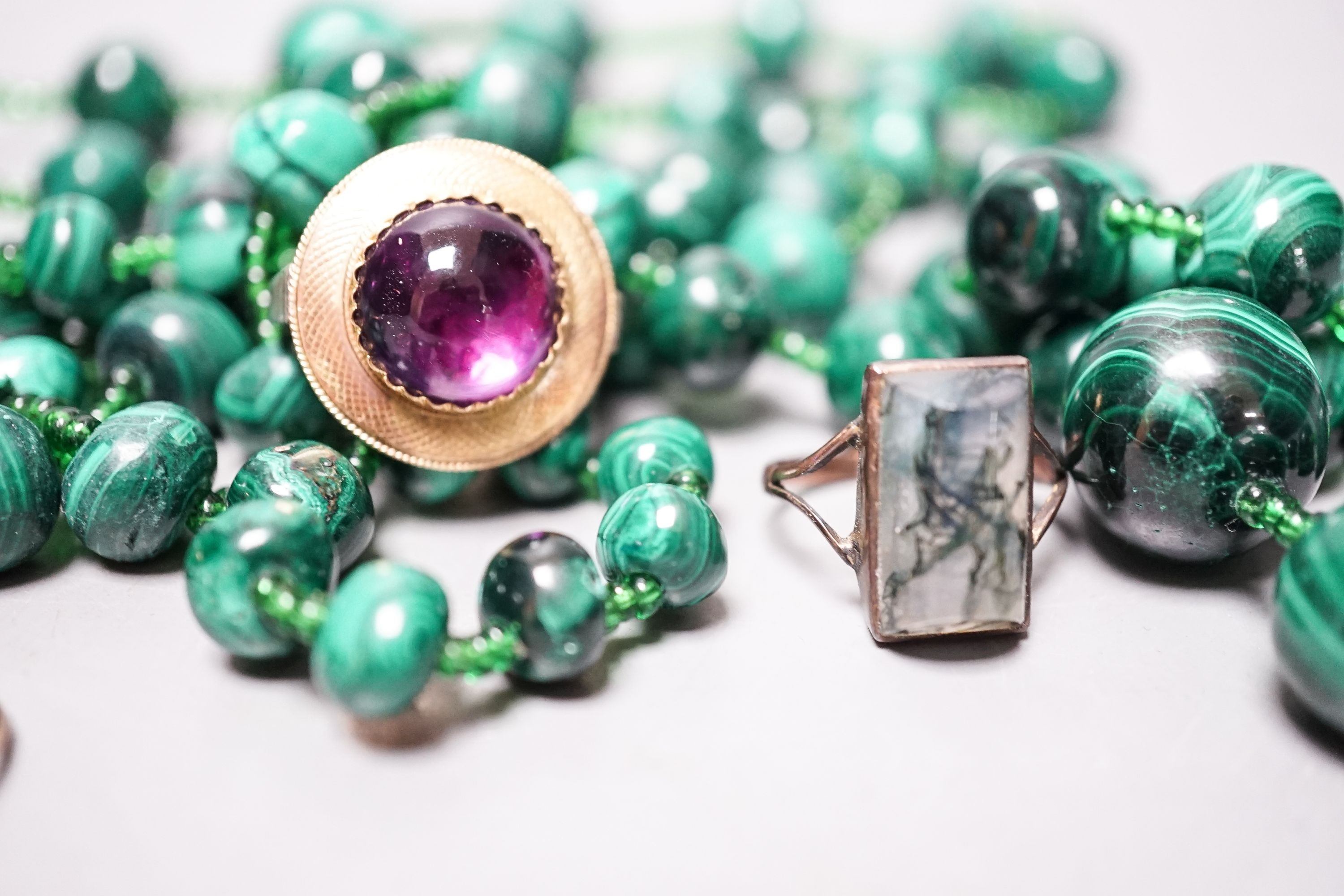 A cabochon amethyst ring (adapted), an 198ct gold shank, 4.4 grams and mixed jewellery including malachite necklaces, rings, bangle etc.